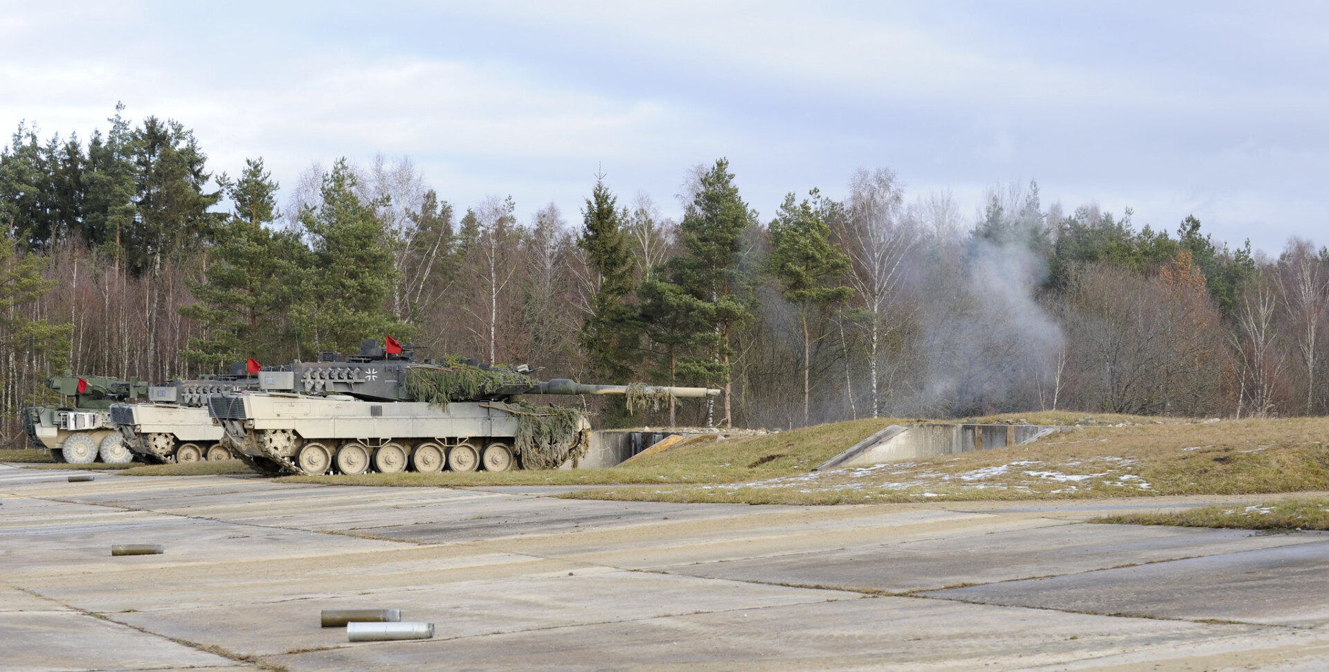 "Combined Fire" by U.S. Army Europe is marked with Public Domain Mark 1.0.