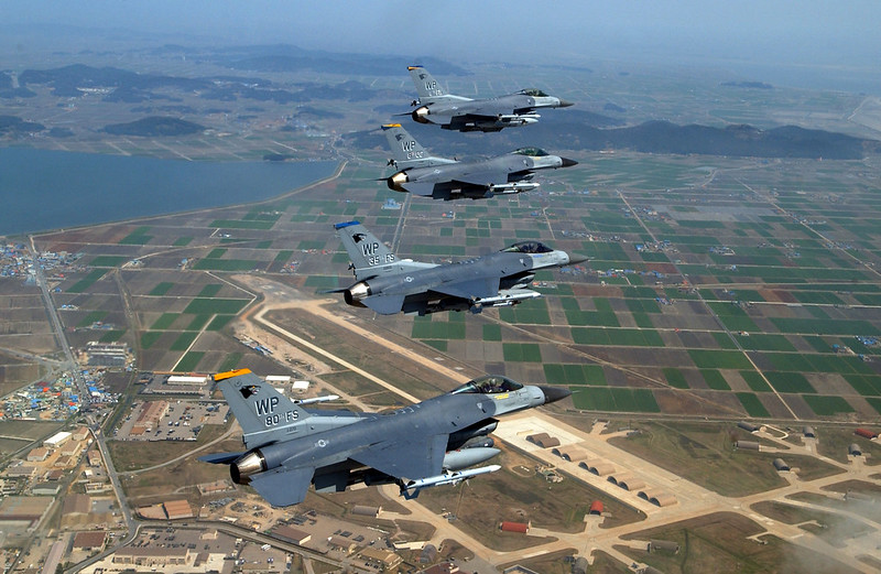 "General Dynamics F-16 'Fighting Falcons'" by aeroman3 is marked with CC0 1.0.